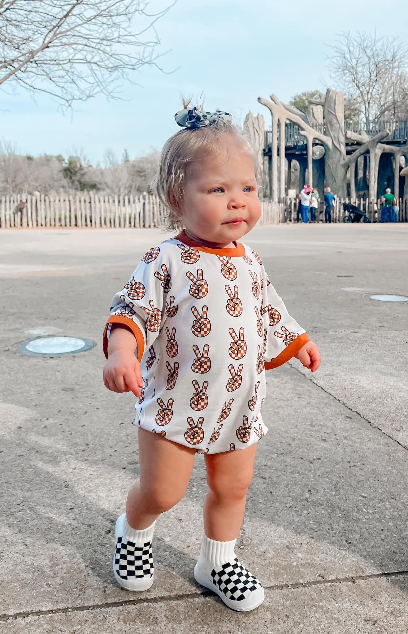 Peace Out Oversized Bubble Romper