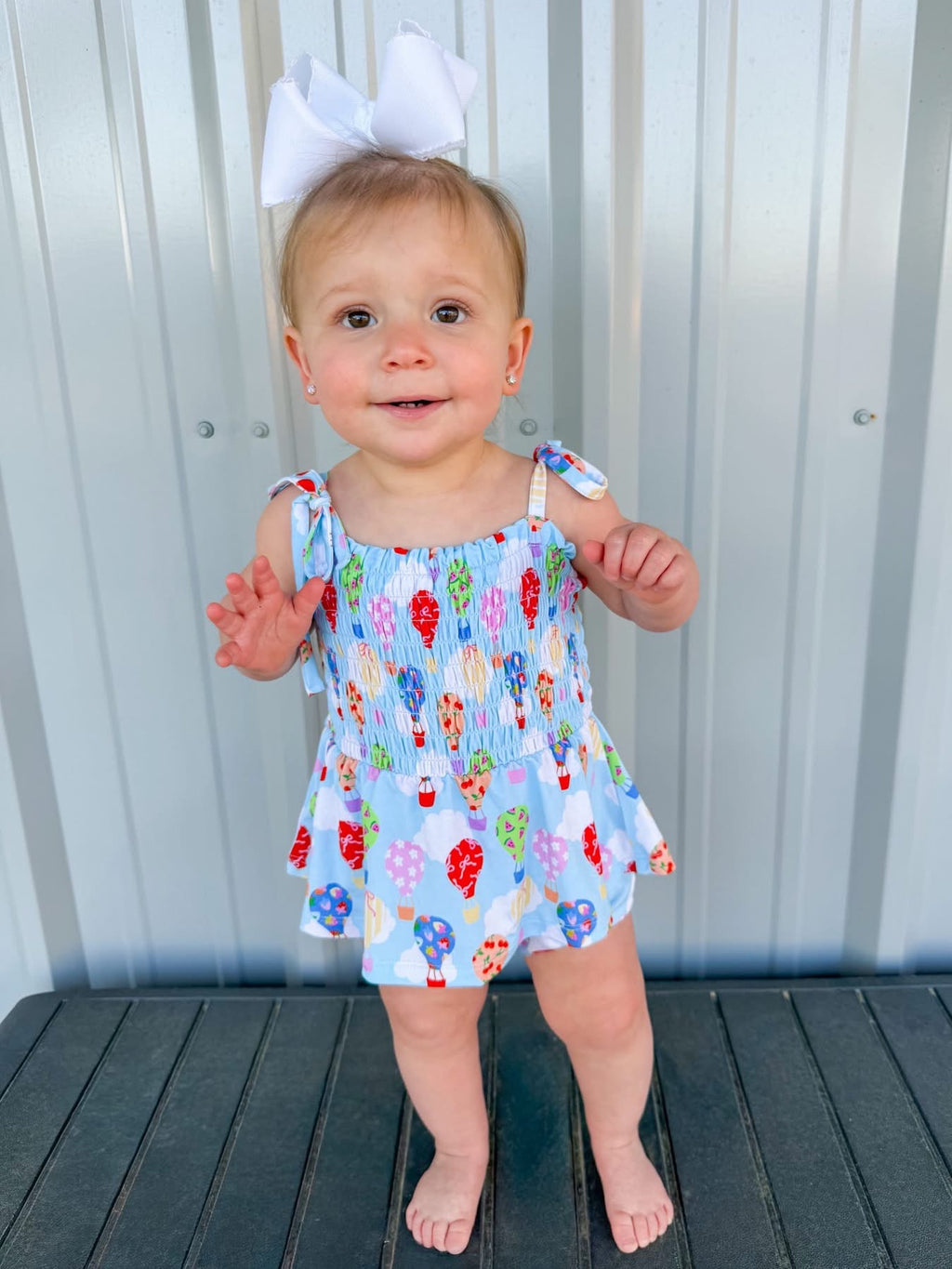 Sweet Skies Smocked Twirl Romper