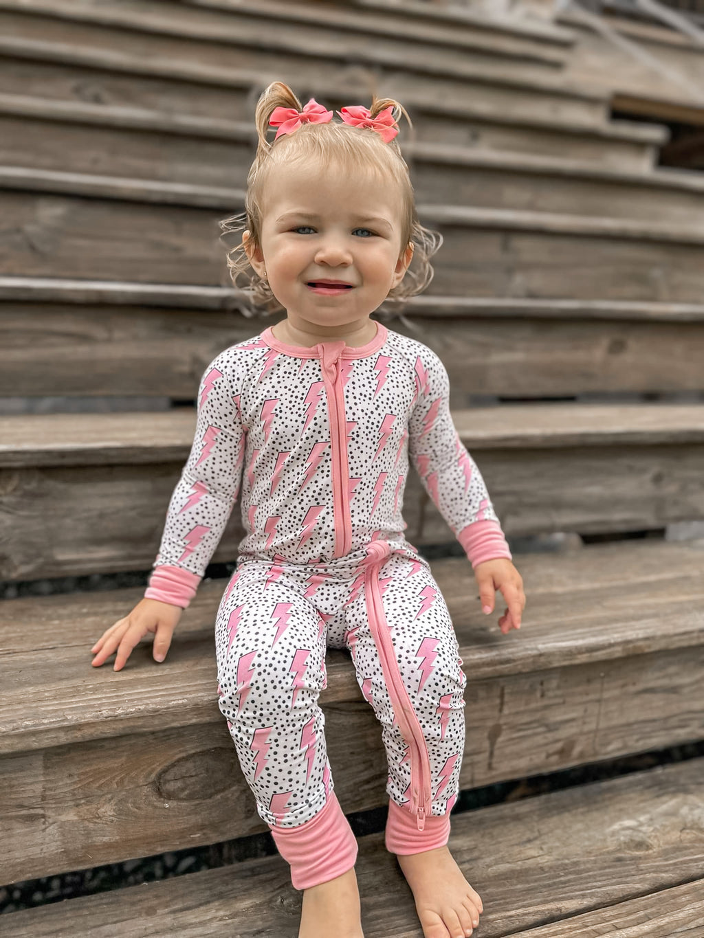Pink Bolts Double Zippy Romper